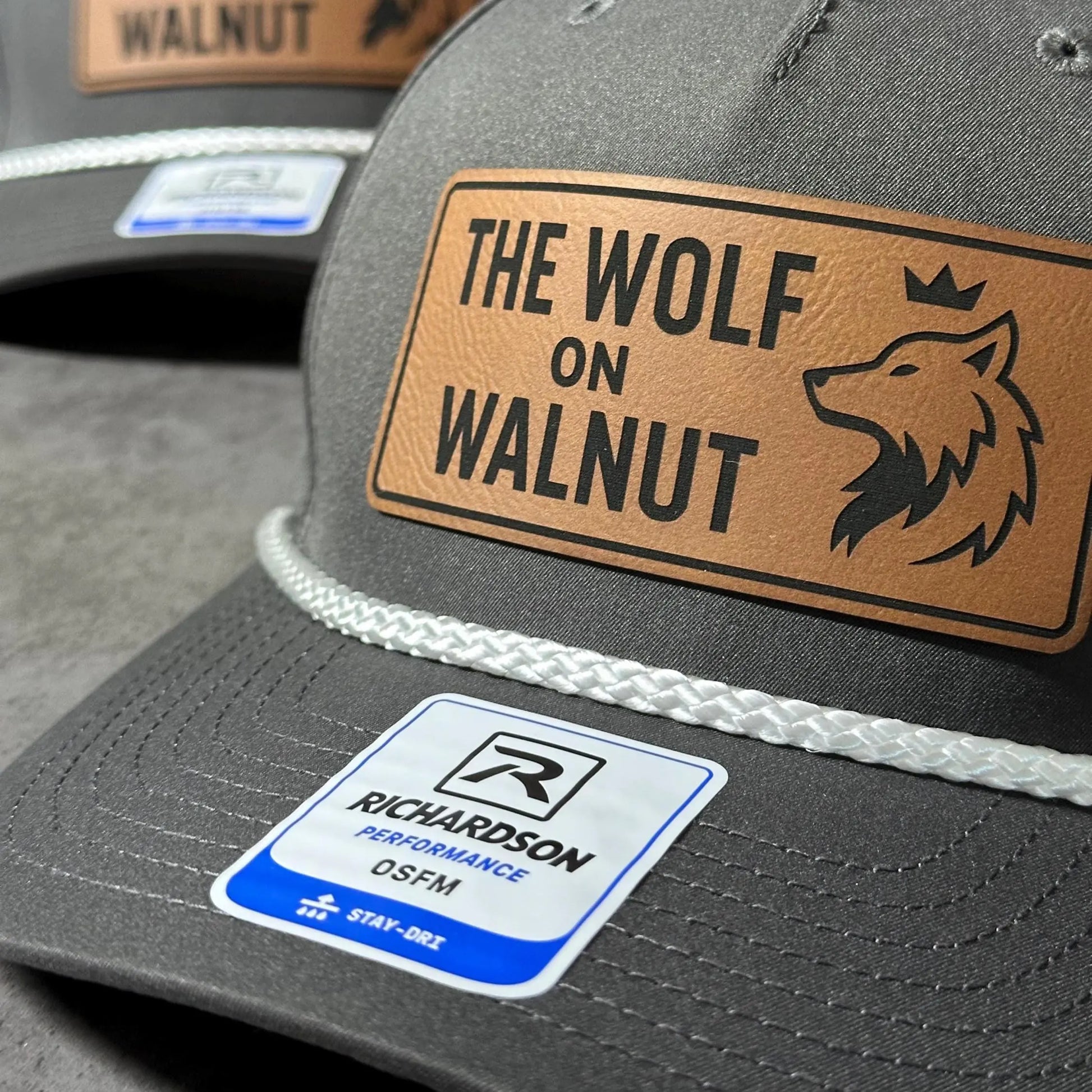 Custom company hat with engraved patch and rope detail