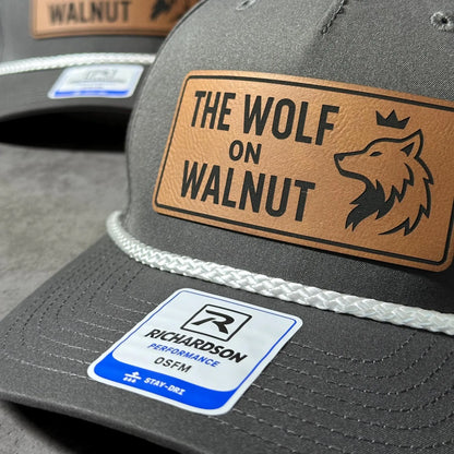 Custom company hat with engraved patch and rope detail