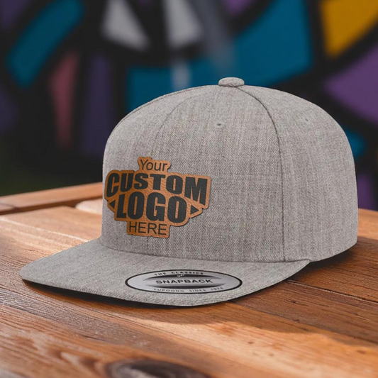 a gray and orange hat sitting on top of a wooden table