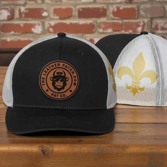 two hats sitting on top of a wooden table
