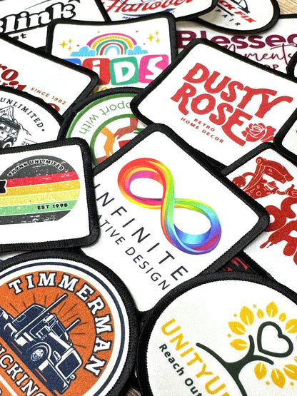 a collection of various logos and patches, including a rainbow-colored infinity symbol, a truck logo, and other abstract designs.