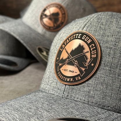 FlexFit 110 Trucker Hat + Leather Patch The Leather Patch