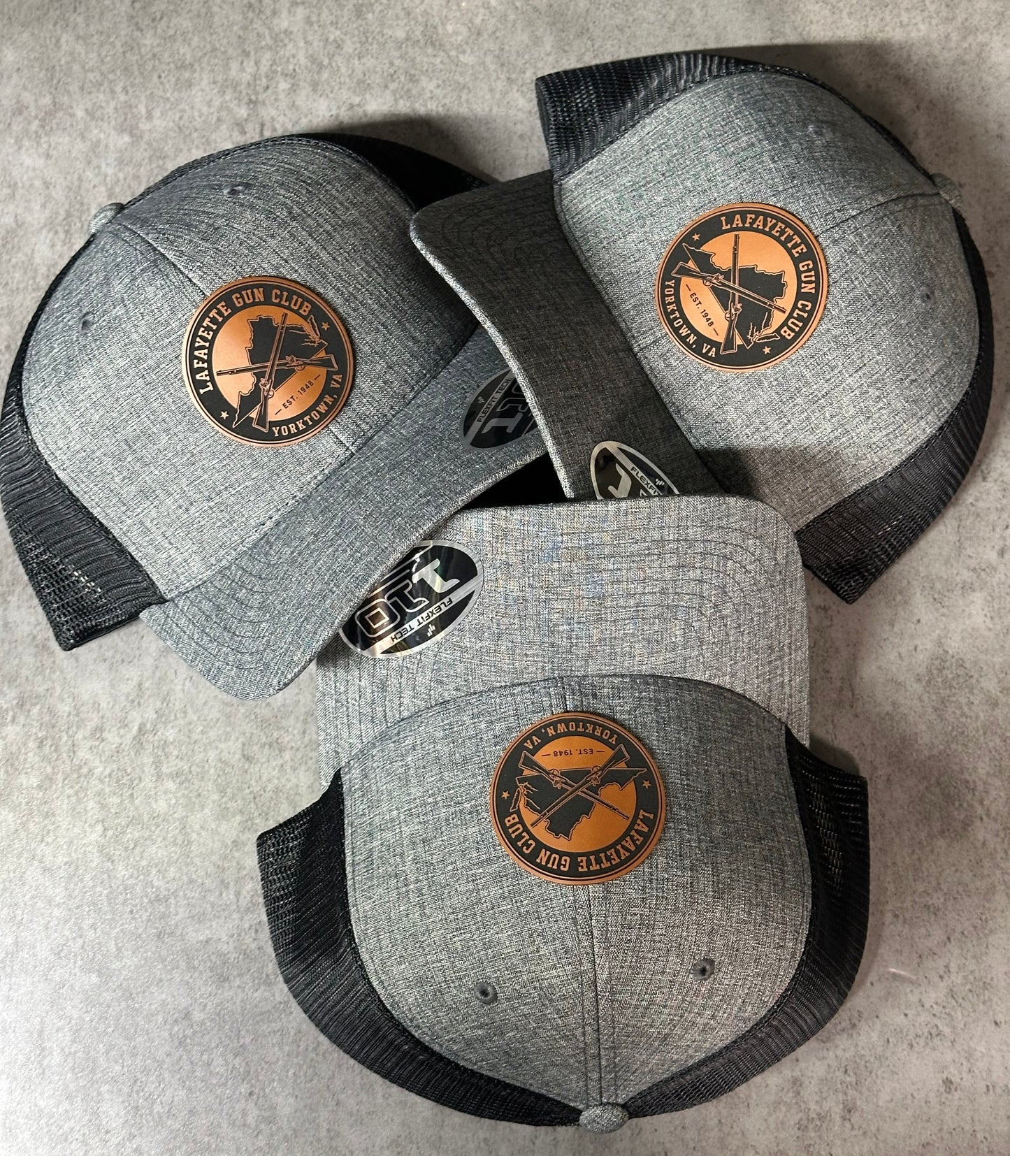 FlexFit 110 Trucker Hat + Leather Patch The Leather Patch