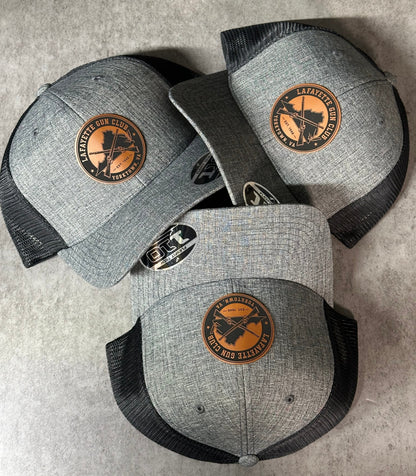 FlexFit 110 Trucker Hat + Leather Patch The Leather Patch