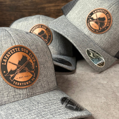 FlexFit 110 Trucker Hat + Leather Patch The Leather Patch