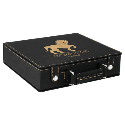 a black suitcase with a gold lion on it