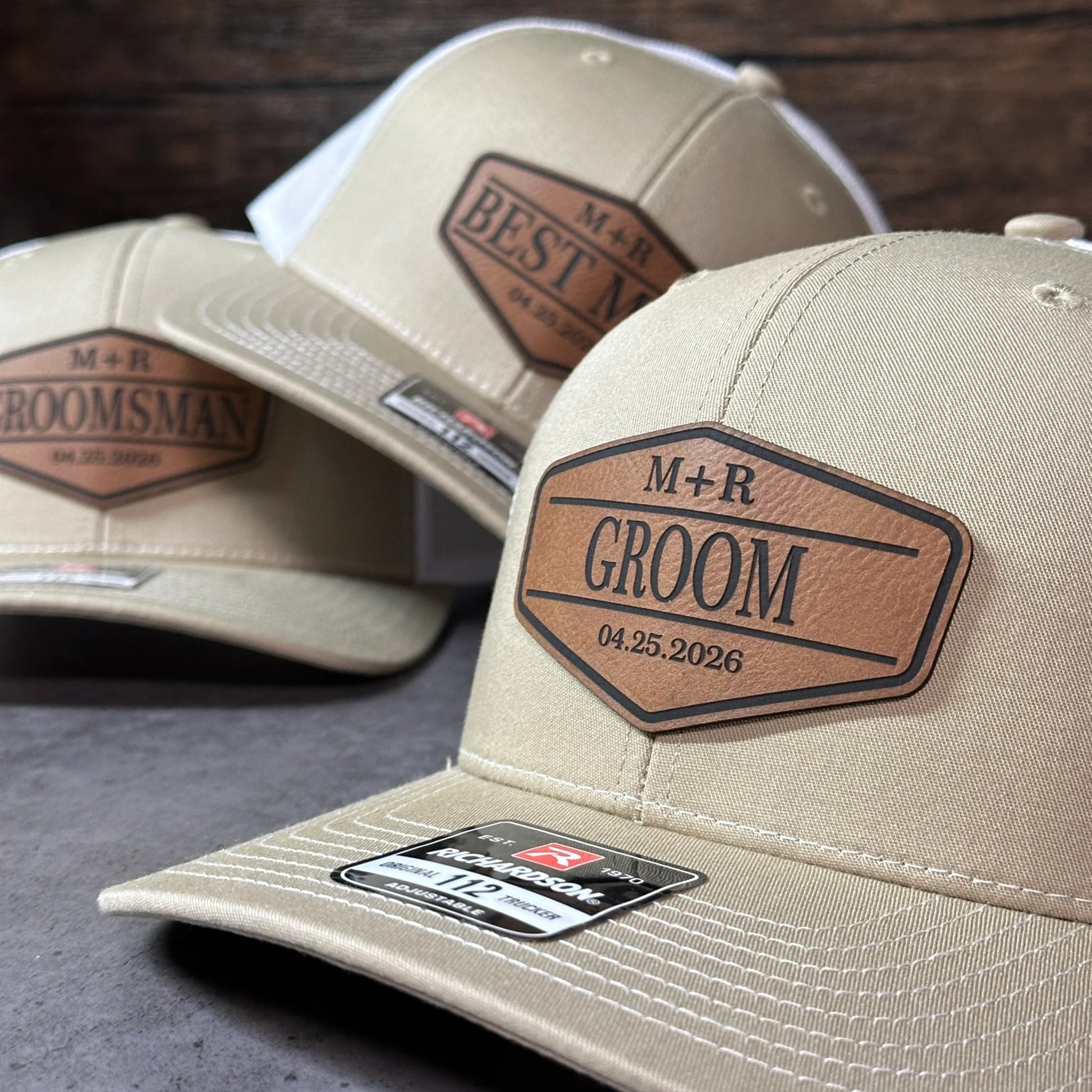 a close-up view of a beige baseball cap with a personalized label on it.